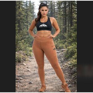 Nike Epic Luxe Trail Leggings Large Copper Brown Mid Rise Pockets Outdoor DM7575